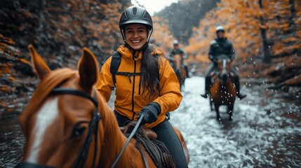 Fototapeta premium A joyful woman rides a horse through a colorful autumn forest, joined by others, creating a picturesque outdoor adventure scene.
