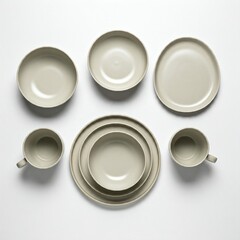 beige minimalist style ceramic dishes and cups on white background
