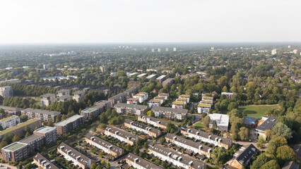 Aerial View of Residential Neighborhood Surrounded by Greenery