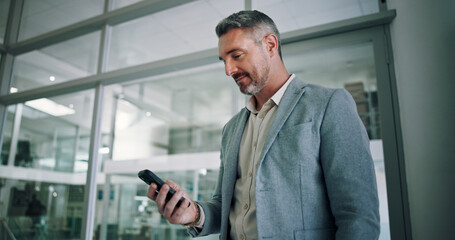 Businessman, phone and office for email notification, contact client and reading news report. Male person, accountant and online for economy update in workplace, trading website and communication