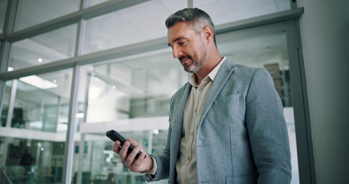 Businessman, phone and office for email notification, contact client and reading news report. Male person, accountant and online for economy update in workplace, trading website and communication
