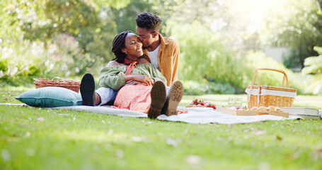 Kiss, relax and love with black couple and picnic for bonding, happiness and romantic date. Smile, support and conversation with man and woman at park for commitment, valentines day and summer