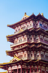 Naklejka premium ancient pagoda Chinese buddhist temple on the blue sky