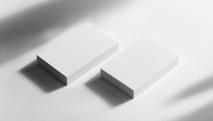Minimalist business cards on a clean background for modern branding concepts.