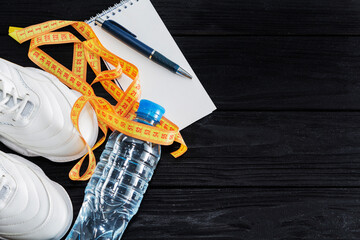 sports shoes, water bottle, the concept of a healthy lifestyle