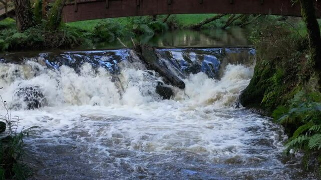 Scenic footage of a small waterfall on Anllons River in Gabelle Recreation Area, A Coruna, Spain
