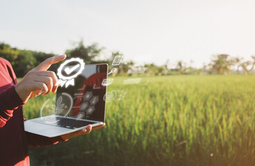 technology as a skilled farmer analyzes plant data on a virtual screen, revolutionizing agricultural practices and safeguarding our planet.