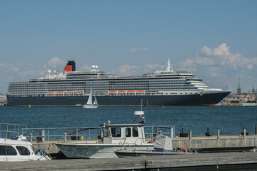 Luxury classic ocean liner cruiseship cruise ship Victoria in port of Helsinki, Finland with city...