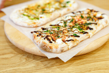 Macro closeup of different kinds of pizza