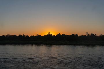 Fototapeta premium Sunset on the river nile from a boat. Sunsets.