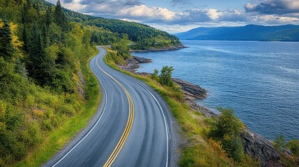 Bird's-eye view of a coastal bike track along the shoreline, empty and scenic, no people, stunning natural surroundings, high resolution stock photo