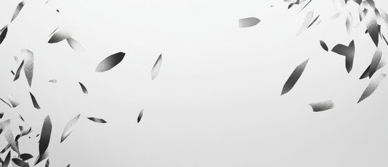 Fototapeta premium A black and white image of leaves and feathers