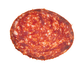 slice of salami with paprika isolated
