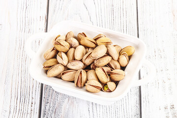 Salted tasty pistachio nuts heap