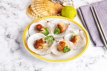 Grilled scallops shell with butter