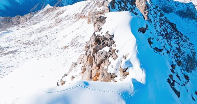 aerial view of extreme climber footprint on the top of Dagu glacier snow mountain summit at Sichuan China