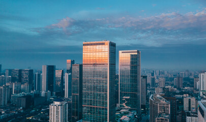 Fototapeta premium modern office building with sunrise
