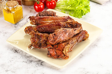 Roasted duck wings with sauce