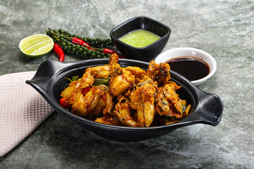 Vietnamese cuisine - fried frog with vegetables
