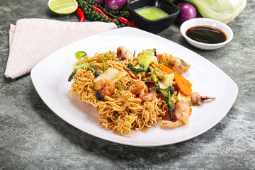 Asian cuisine - Fried noodles with seafood