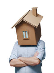Pensive man with head inside a cardboard house