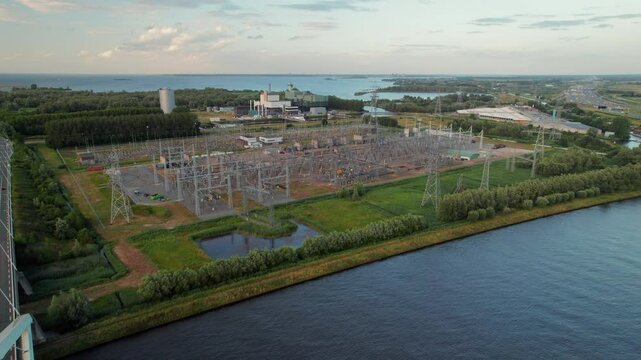 Aerial View Of Power Plant Station on The Riverbank In Diemen, Amsterdam
