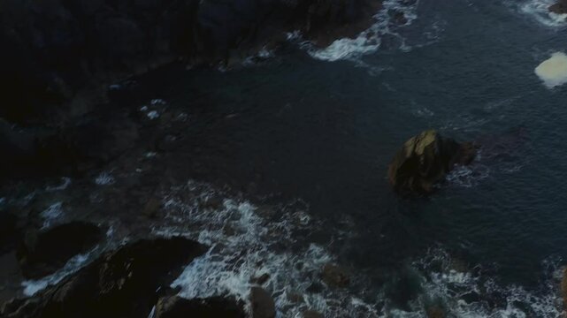 Aerial parallax of Hell's Hole coast, vast landscape, and Malin Signal Tower, Co. Donegal