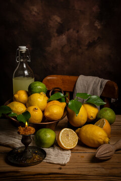 Table with lemons, limes and lemonade