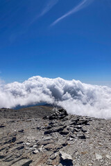 Cloudy over mountains on hiking trail to Mulhacen peak, Sierra Nevada National park, Andalusia, Spain