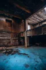 Soviet ruins of the plant. The abandoned building was overgrown with greenery and collapsed.