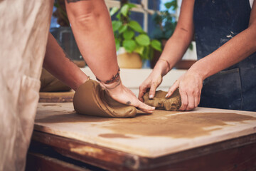 Pottery, teamwork and clay with hands in workshop for partnership, small business and creative....