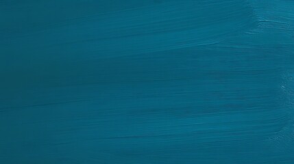 Solid teal blue background with a smooth, flat texture