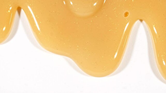 Sparkling Gold Waves. Liquid Gold motion. Golden Wave Background. Glitter Fluid Motion. Molten Gold. Lava, Nougat, Caramel, Amber, Honey, Oil. High quality 4k footage