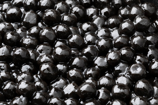 Cooked black tapioca pearls close up full frame as background