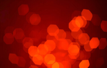 Warm toned bokeh effect with blurred, flame like shapes