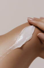 Close-Up of Translucent Body Cream Application on Shoulder – Smooth, Glowing Skin with Minimalist Light Grey Background