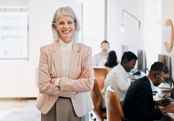 Call center, crossed arms and portrait of woman in office for leadership, management and career. Happy, business and mature person with staff for telemarketing, customer support and online service