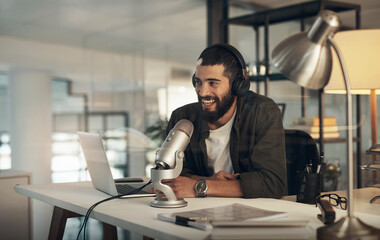 Radio host, home and man with laptop, microphone or speaking with communication in lounge. Person,...