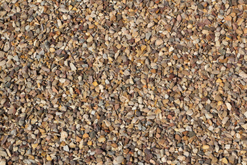 Gravel texture can vary depending on its origin and the extraction process. Generally, gravel has a...
