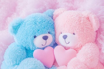 Fototapeta premium Soft and Cuddly Blue and Pink Teddy Bears Holding Hearts in a Plush Background for a Cute and Charming Atmosphere Perfect for Valentine's Day or Baby Theme