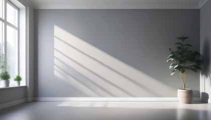 Fototapeta premium Pale gray wall with soft, cool morning light from nearby window.