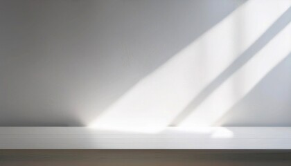Clean white wall with soft natural morning light.