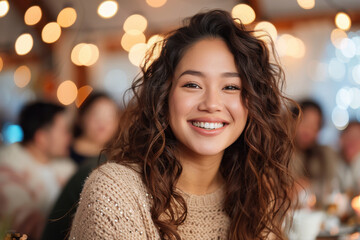 National Call a Friend Day. A young woman with curly hair smiles warmly, surrounded by festive bokeh lights, creating a joyful and inviting atmosphere.
