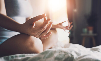 Hands, lotus and woman with meditation, yoga and wellness with breathing, fitness and morning...