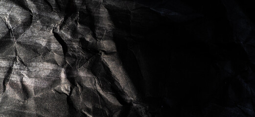 でこぼこな黒い色の背景