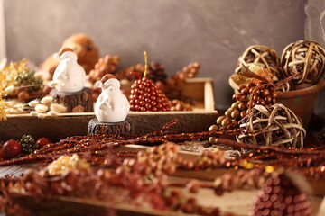 Festive Snowman Figurines with Natural Holiday Decor, Perfect for Cozy and Rustic Christmas Scenes