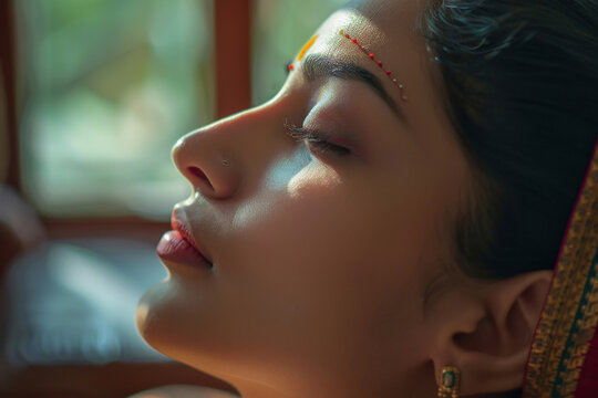 Indian woman from indian is having therapy in the beauty therapy room.