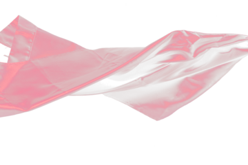 Red Satin fabric flying in curve shape, Piece of textile Red Satin fabric throw fall in air. Black background isolated motion blur