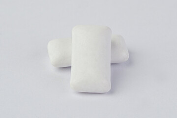 Chewing gum pads. Pellet chewing gums isolated on white. Chewing gum pads close up.