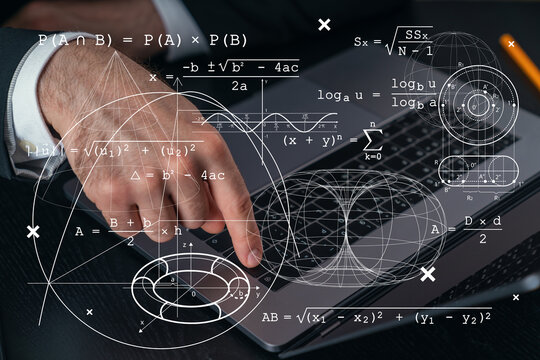 Hand on laptop keyboard with complex mathematical formulas overlayed in transparent style.